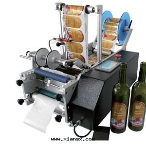 DF-T-200型半自(zì)動(dòng)圆(yuán)瓶(píng)貼标機(jī)